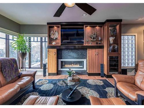 954 Drury Avenue Ne, Calgary, AB - Indoor Photo Showing Living Room With Fireplace