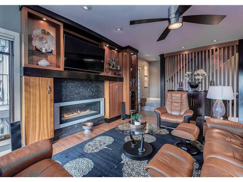 954 Drury Avenue Ne, Calgary, AB - Indoor Photo Showing Living Room With Fireplace