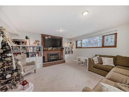 4179 Varsity Road Nw, Calgary, AB - Indoor Photo Showing Living Room With Fireplace