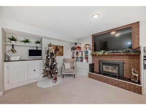 4179 Varsity Road Nw, Calgary, AB - Indoor Photo Showing Living Room With Fireplace