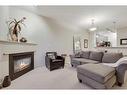 405-830 Centre Avenue Ne, Calgary, AB  - Indoor Photo Showing Living Room With Fireplace 