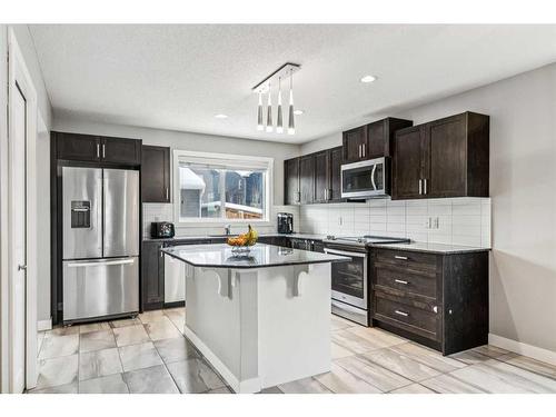 73 Legacy Glen Street Se, Calgary, AB - Indoor Photo Showing Kitchen With Stainless Steel Kitchen