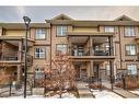 55 Evanscrest Court Nw, Calgary, AB  - Outdoor With Balcony With Facade 