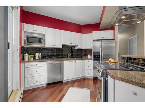 202-4835 Dalhousie Drive Nw, Calgary, AB - Indoor Photo Showing Kitchen With Stainless Steel Kitchen