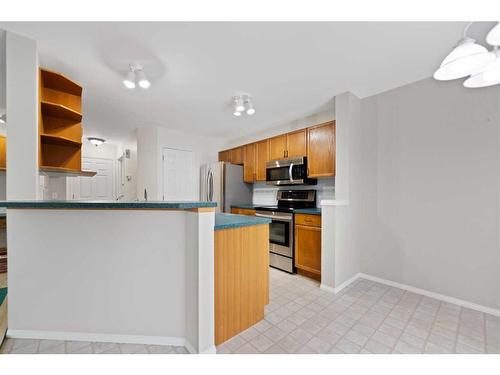 246 Bridelwood Court Sw, Calgary, AB - Indoor Photo Showing Kitchen