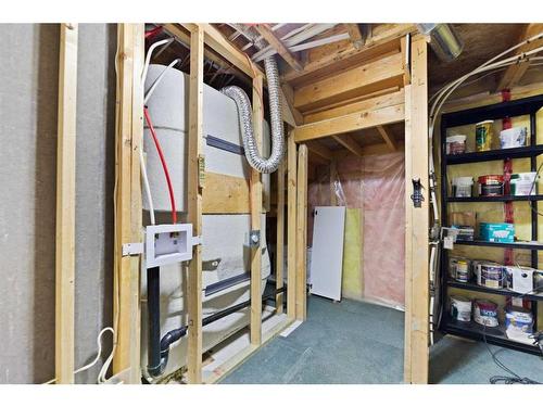 246 Bridelwood Court Sw, Calgary, AB - Indoor Photo Showing Basement