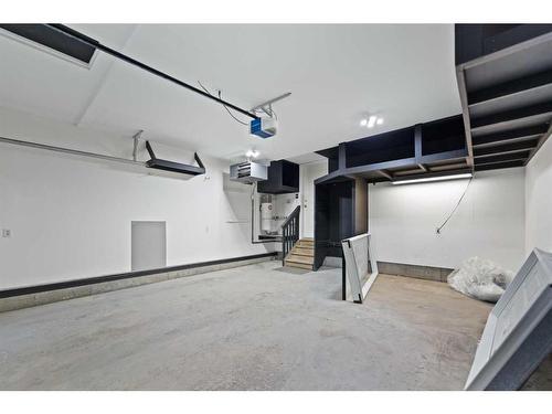 246 Bridelwood Court Sw, Calgary, AB - Indoor Photo Showing Garage