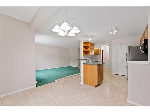 246 Bridelwood Court Sw, Calgary, AB - Indoor Photo Showing Kitchen