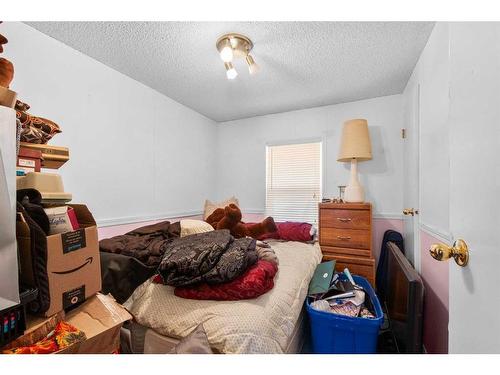 28370 Township Road 304, Rural Mountain View County, AB - Indoor Photo Showing Bedroom