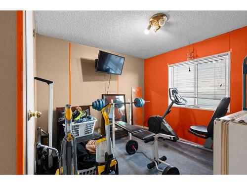 28370 Township Road 304, Rural Mountain View County, AB - Indoor Photo Showing Gym Room