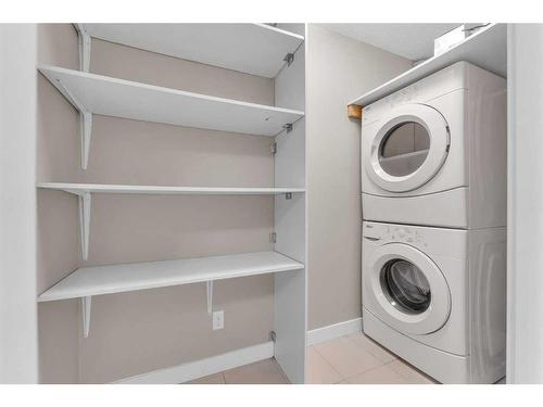 201-195 Kincora Glen Road Nw, Calgary, AB - Indoor Photo Showing Laundry Room