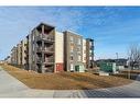 201-195 Kincora Glen Road Nw, Calgary, AB  - Outdoor With Balcony With Facade 