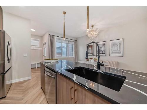 132 Cobblestone Gate, Airdrie, AB - Indoor Photo Showing Kitchen With Double Sink