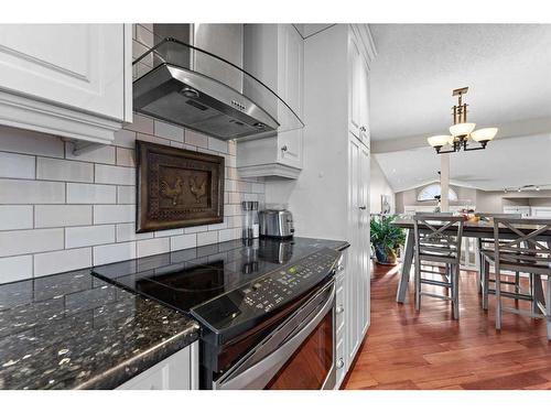 2 Edmund Way Se, Airdrie, AB - Indoor Photo Showing Kitchen With Upgraded Kitchen