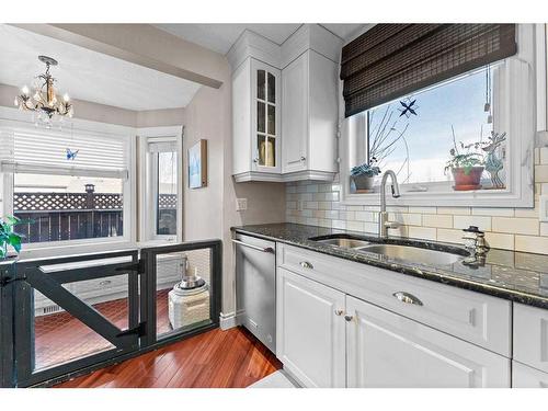 2 Edmund Way Se, Airdrie, AB - Indoor Photo Showing Kitchen With Double Sink