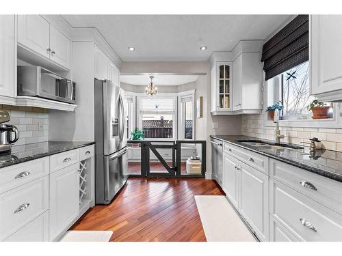 2 Edmund Way Se, Airdrie, AB - Indoor Photo Showing Kitchen With Upgraded Kitchen