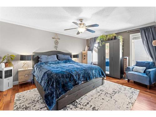 2 Edmund Way Se, Airdrie, AB - Indoor Photo Showing Bedroom