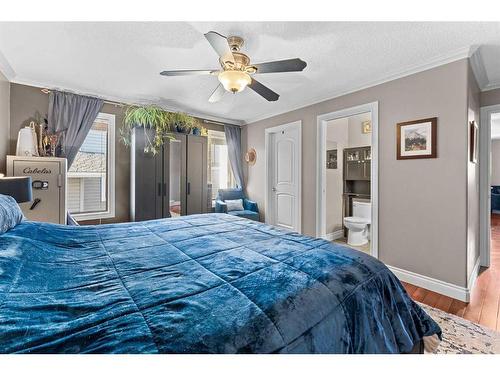 2 Edmund Way Se, Airdrie, AB - Indoor Photo Showing Bedroom