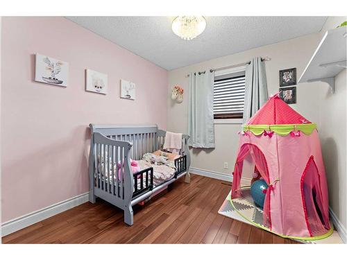 2 Edmund Way Se, Airdrie, AB - Indoor Photo Showing Bedroom