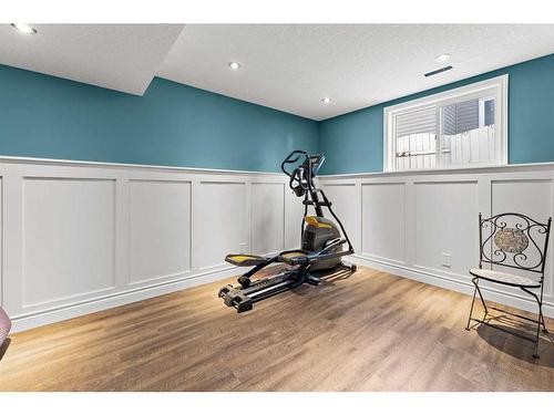 2 Edmund Way Se, Airdrie, AB - Indoor Photo Showing Gym Room