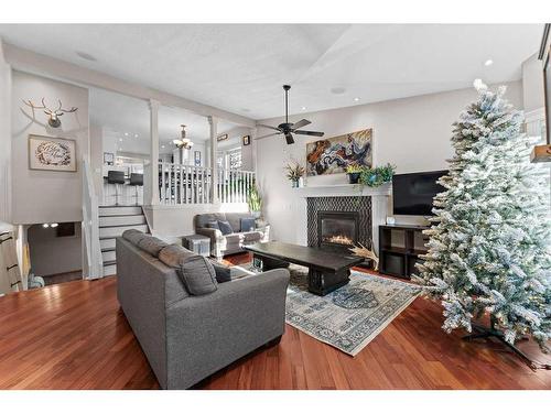 2 Edmund Way Se, Airdrie, AB - Indoor Photo Showing Living Room With Fireplace