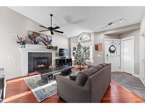 2 Edmund Way Se, Airdrie, AB - Indoor Photo Showing Living Room With Fireplace