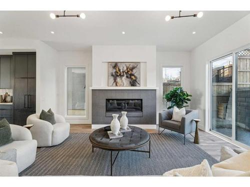 2036 30 Avenue Sw, Calgary, AB - Indoor Photo Showing Living Room With Fireplace