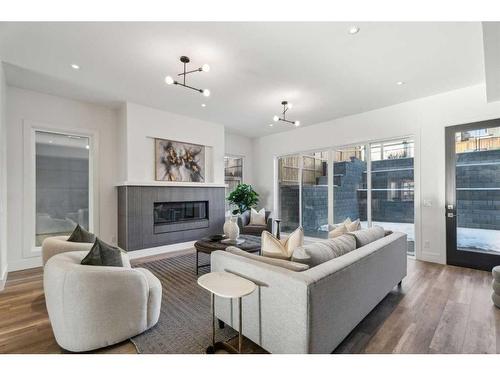 2036 30 Avenue Sw, Calgary, AB - Indoor Photo Showing Living Room With Fireplace