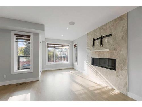 1806 8 Street Sw, Calgary, AB - Indoor Photo Showing Living Room With Fireplace