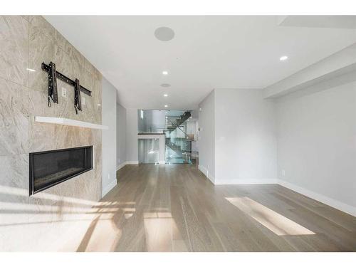 1806 8 Street Sw, Calgary, AB - Indoor Photo Showing Living Room With Fireplace