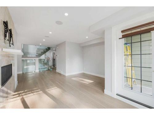 1806 8 Street Sw, Calgary, AB - Indoor Photo Showing Other Room With Fireplace