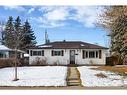 116 Glacier Drive Sw, Calgary, AB  - Outdoor With Facade 