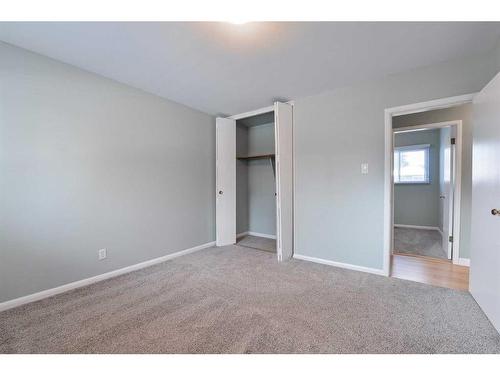 116 Glacier Drive Sw, Calgary, AB - Indoor Photo Showing Other Room