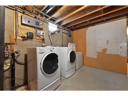 116 Glacier Drive Sw, Calgary, AB - Indoor Photo Showing Laundry Room