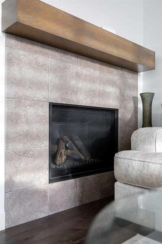 24 Sherwood Park Nw, Calgary, AB - Indoor Photo Showing Living Room With Fireplace