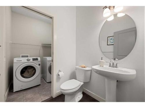 24 Sherwood Park Nw, Calgary, AB - Indoor Photo Showing Laundry Room