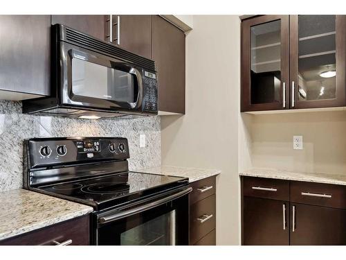 1319-8880 Horton Road Sw, Calgary, AB - Indoor Photo Showing Kitchen