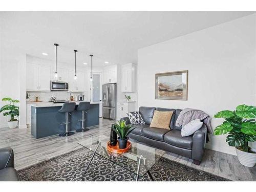 1033 Iron Landing Way, Crossfield, AB - Indoor Photo Showing Living Room