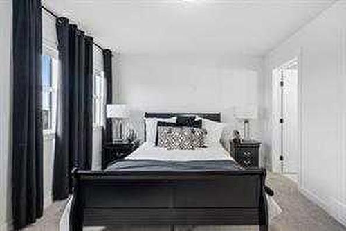 1033 Iron Landing Way, Crossfield, AB - Indoor Photo Showing Bedroom