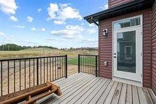 1033 Iron Landing Way, Crossfield, AB - Outdoor With Deck Patio Veranda