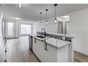 2217-700 Willowbrook Road Nw, Airdrie, AB  - Indoor Photo Showing Kitchen With Double Sink 