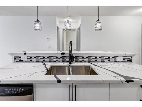 2217-700 Willowbrook Road Nw, Airdrie, AB - Indoor Photo Showing Kitchen