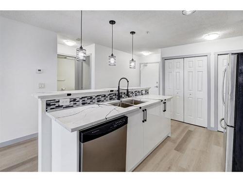 2217-700 Willowbrook Road Nw, Airdrie, AB - Indoor Photo Showing Kitchen With Double Sink With Upgraded Kitchen