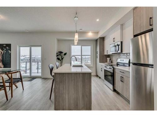 88-2117 81 Street Sw, Calgary, AB - Indoor Photo Showing Kitchen With Stainless Steel Kitchen