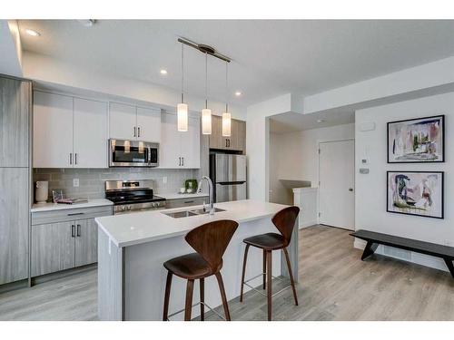 88-2117 81 Street Sw, Calgary, AB - Indoor Photo Showing Kitchen With Stainless Steel Kitchen With Double Sink With Upgraded Kitchen