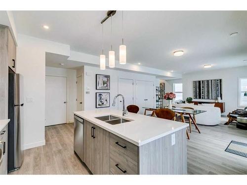 88-2117 81 Street Sw, Calgary, AB - Indoor Photo Showing Kitchen With Double Sink