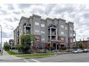 403-1108 15 Street Sw, Calgary, AB  - Outdoor With Balcony With Facade 