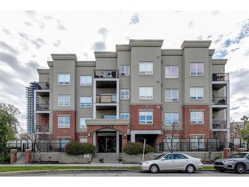 403-1108 15 Street Sw, Calgary, AB - Outdoor With Balcony With Facade