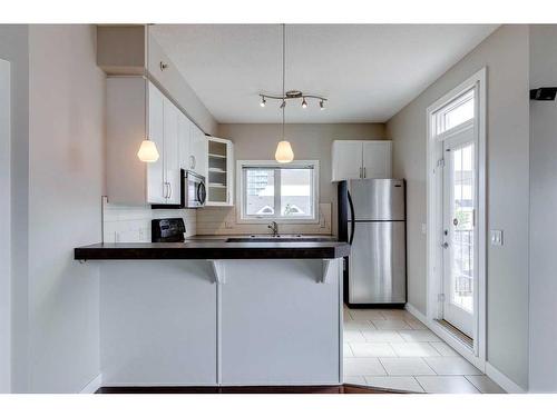 403-1108 15 Street Sw, Calgary, AB - Indoor Photo Showing Kitchen