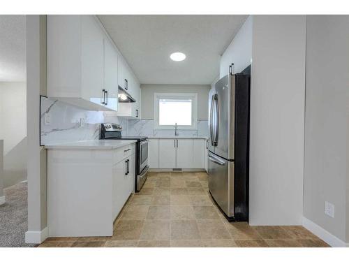 23 Martinwood Court Ne, Calgary, AB - Indoor Photo Showing Kitchen